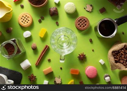 cup and ingredients at colorful paper background