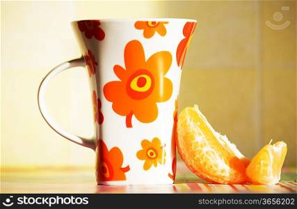 cup and orange