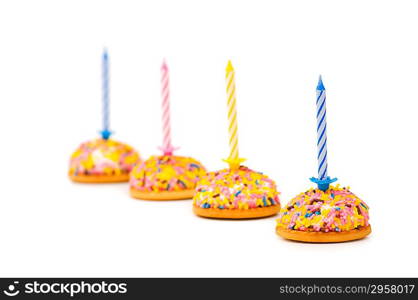 Cup cakes and candle isolated on the white background