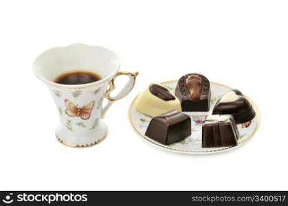 cup coffee and candies isolated on a white