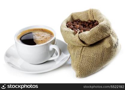 cup of black coffee and beans in canvas sack on white background
