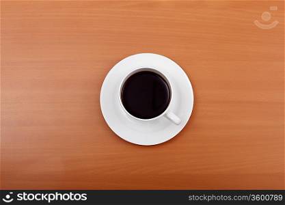 Cup of black coffee in a white cup