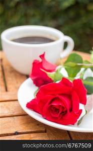 Cup of black coffee in home garden, stock photo