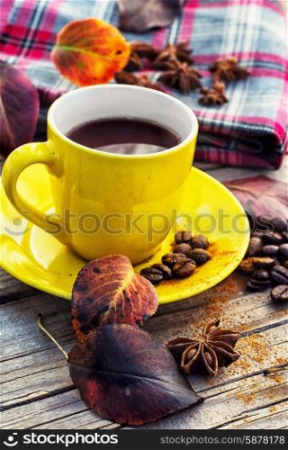 Cup of black coffee on background