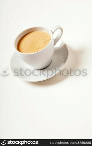 Cup of cafe espresso coffee on a white background.