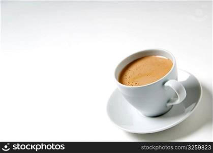 Cup of cappuccino on white background.