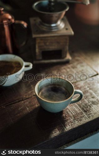 Cup of coffee americano on wood bar.  