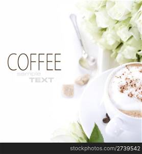 cup of coffee and a bouquet of delicate white roses on white background