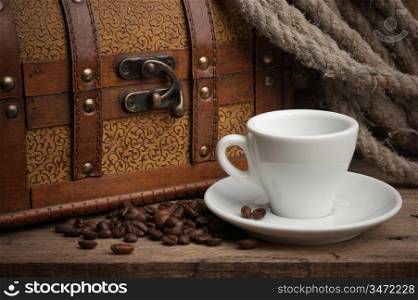 cup of coffee and a chest, still life