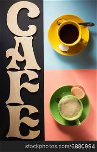 cup of coffee and cacao at colorful background
