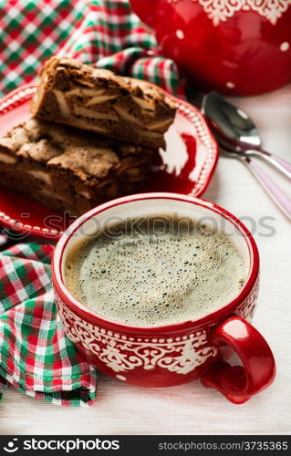 Cup of coffee and chocolate pie, selective focus