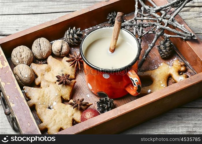 Cup of coffee and christmas symbol in wooden box