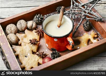 Cup of coffee and christmas symbol in wooden box