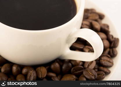 cup of coffee and coffee beans