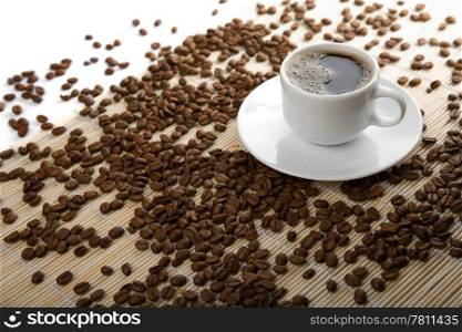 cup of coffee and coffee beans isolated
