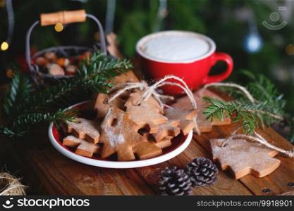 cup of coffee and gingerbread and Christmas decorations 