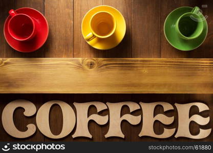 cup of coffee and letters on wooden background