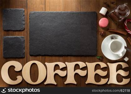 cup of coffee and letters on wooden background
