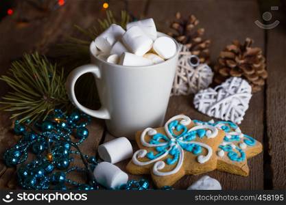 cup of coffee and marshmallows. gingerbread and Christmas decorations