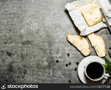 Cup of coffee and sandwiches. On the stone table.. Cup of coffee and sandwiches. On stone table.
