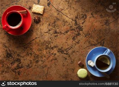 cup of coffee and tea at abstract background