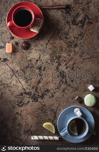 cup of coffee and tea on table background