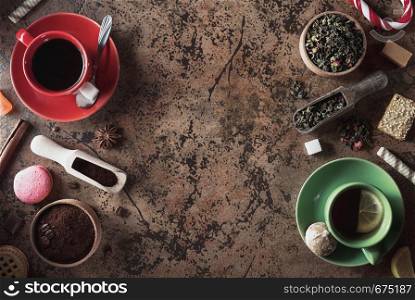 cup of coffee and tea on table background, top view