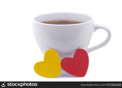 Cup of coffee and two hearts on a white background.