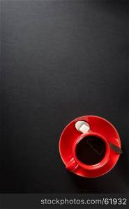 cup of coffee at black background texture