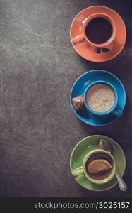 cup of coffee, cacao and tea at table