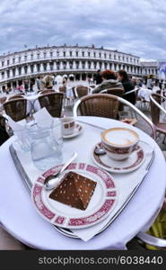 cup of coffee cappucinno drink in outdoor restaurant