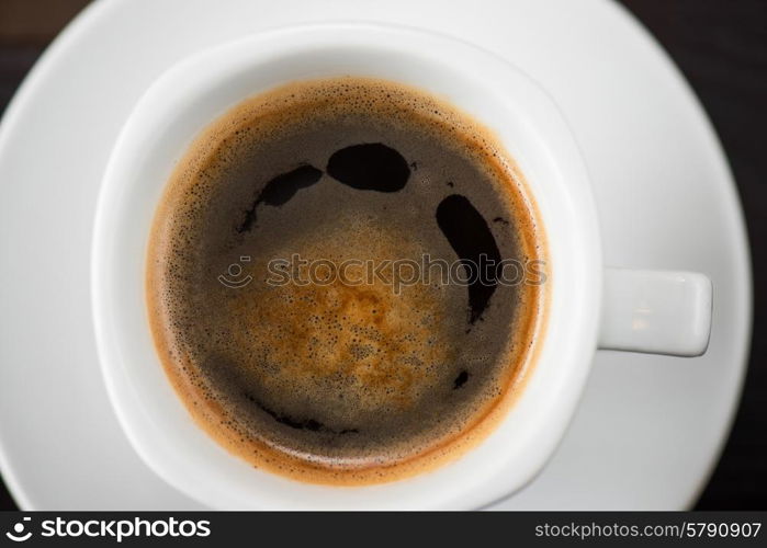 Cup of coffee . Cup of coffee closeup shot from above