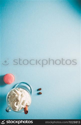 cup of coffee frappe at paper colorful background