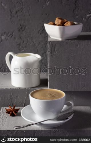 Cup of coffee on concrete grey abstract background texture. Set of coffee and food ingredient. Break concept