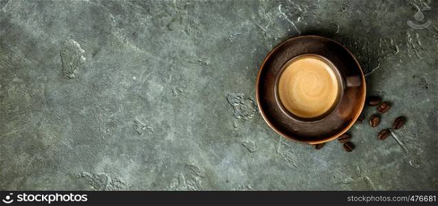 Cup of coffee on rustic background with space for text, flat lay