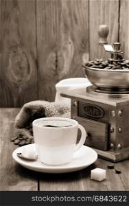 cup of coffee on wood. cup of coffee on wooden background