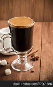 cup of coffee on wood. cup of coffee on wooden background