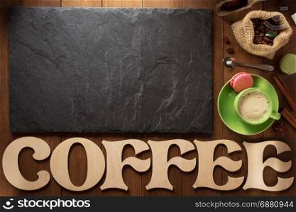 cup of coffee on wooden background
