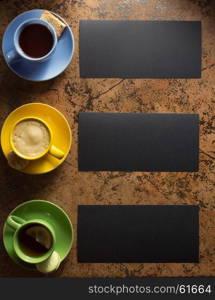 cup of coffee, tea and cacao at abstract background