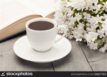 Cup of coffee while reading a book