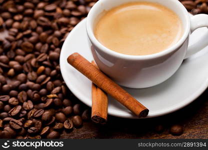 Cup of coffee with cinnamon