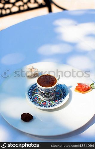 Cup of coffee with desserts