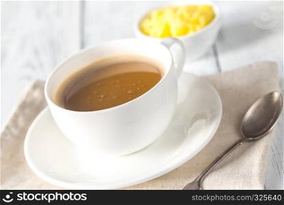Cup of coffee with ghee butter