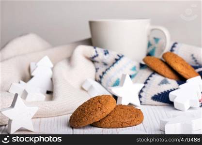 cup of coffee with oat cookies and Christmas decorations