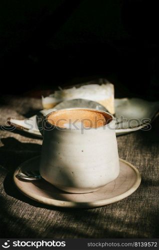Cup of coffee with vintage film filter,shallow Depth of Field,Focus on coffee foam.. Cup of coffee with vintage film filter.