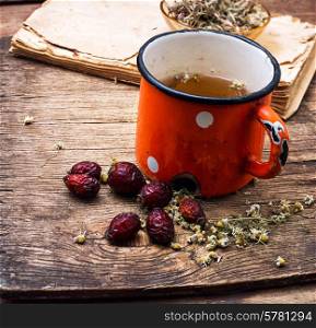 Cup of decoction of medicinal herbs according to the ancient recipe. tea on medicinal herbs