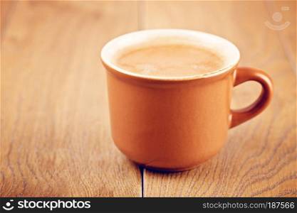 cup of espresso coffee on wooden table. Coffee Cup On Wooden Table