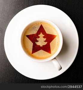 cup of fresh coffee on table, view from above