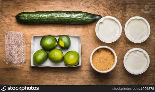 Cup of green cherry tea on dark stone background, top view, place for text