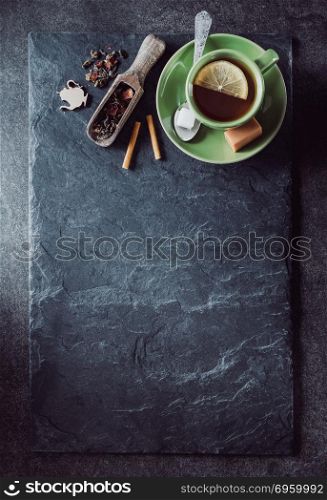 cup of green tea and slate . cup of green tea and slate background